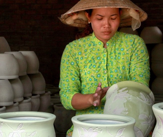 Skillfull woman in the pottery village.